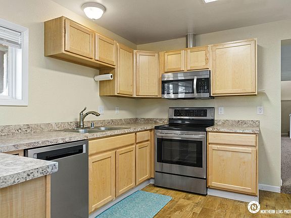 Kitchen sink, Bosch dishwasher, touchscreen range and microwave