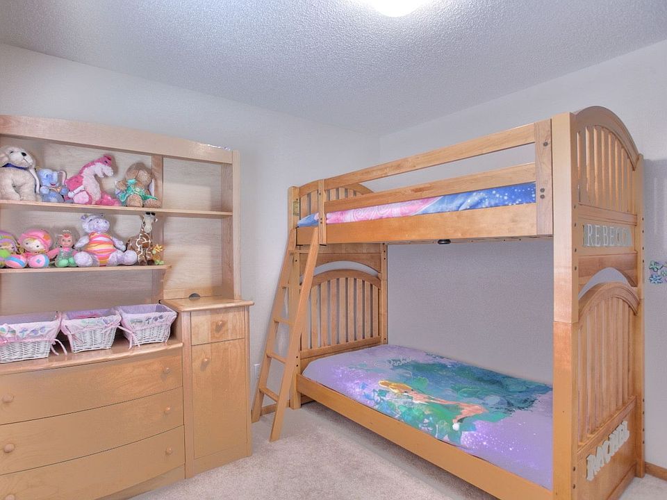 Bedroom 1 with carpet, new light fixture & roomy closet!