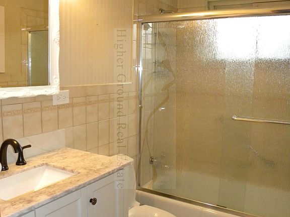 super nice full bath with new vanity