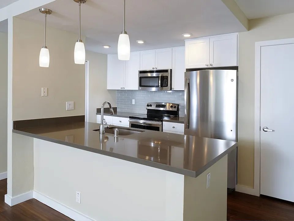 Kitchens With Quartz Countertops Tile Back Splash And Stainless Steel Appliances
