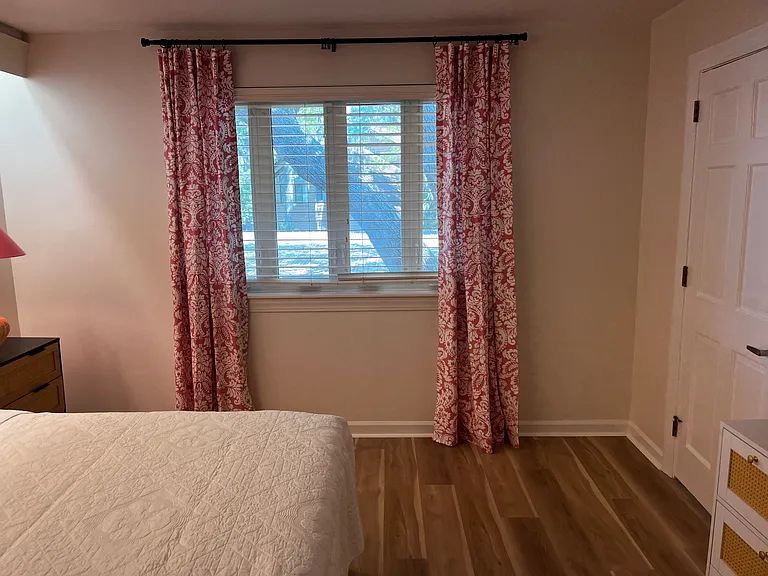 Large window in primary bedroom