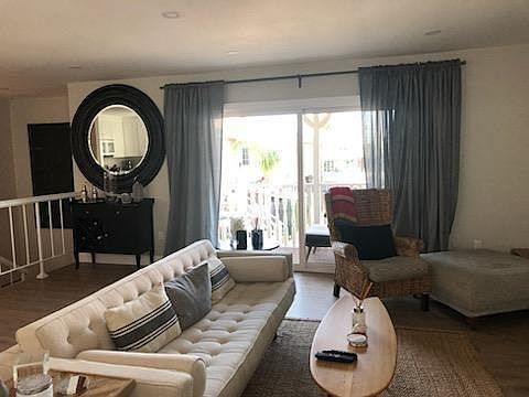 Living room with sliding glass doors to balcony.