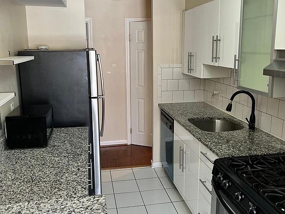 4th image of 3334 Woodburn Village Dr APT 31