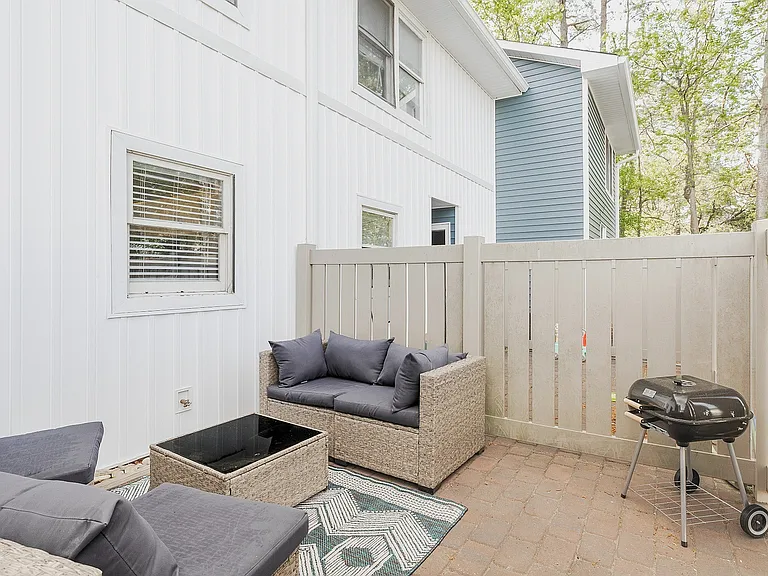 Private fenced back patio with private entrance, great for pets and grilling.
