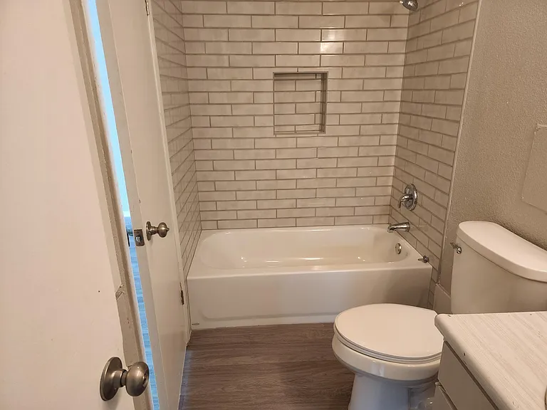 Upstairs full bath; all new tub, tile and toilet