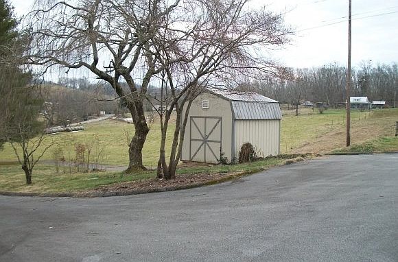 Parking area and shed