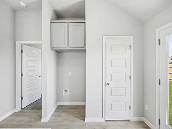 Kitchen in the Pine home plan by Trophy Signature Homes - REPRESENTATIVE PHOTO