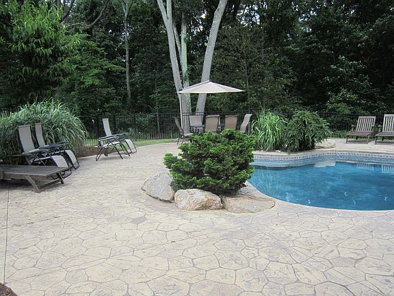 Pool view of Lounge Chairs & Table