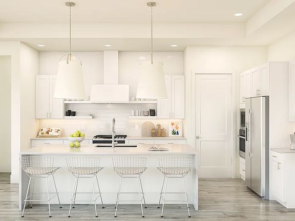 Kitchen with pendant lighting and floating shelves