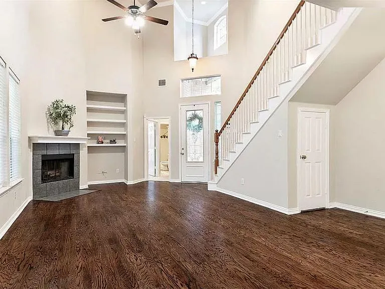 Looking west from Dining toward Living, Foyer, stairs & Bath #1 beyond