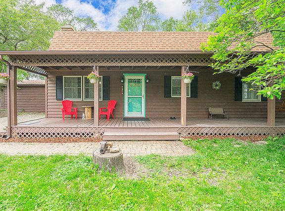 Bring your rocking chairs for this front porch.
