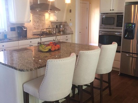 Open Kitchen w/Over-Sized Granite/SS Appliances