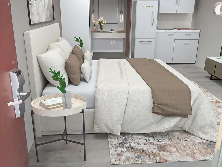 Studio apartment with Complete kitchen functionality with a full-sized refrigerator-freezer, 2-burner cooktop, European dishwasher, and sink