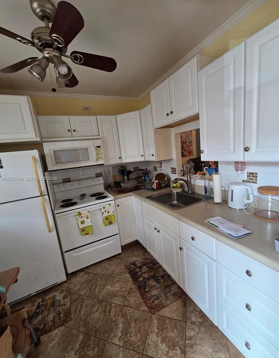 Quinsana Gardens Condo — Photo 4