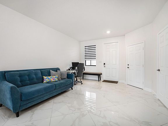 Living/ entry room 
Garage and 1/2 bath room access