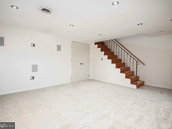 Basement doors leading to bathroom.