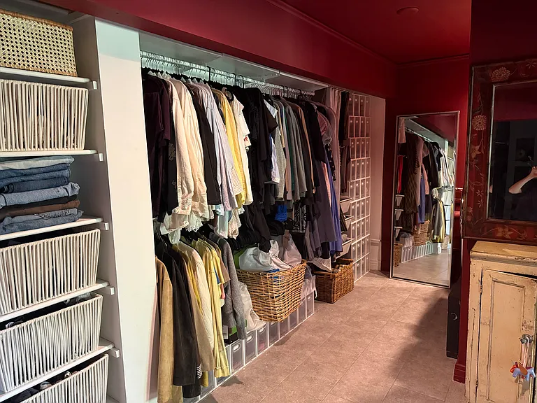 primary bedroom closet/laundry area