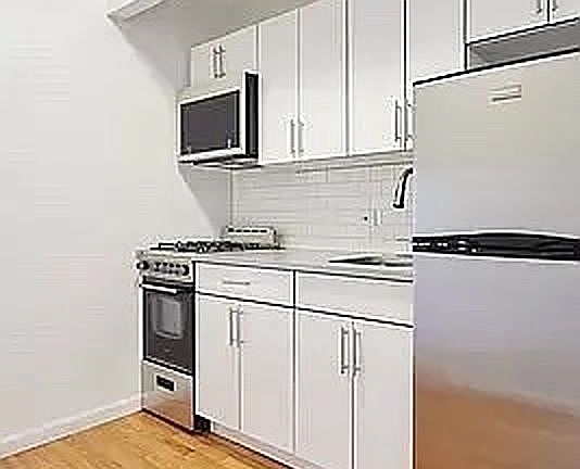 5th image of 347 W 57th St APT 21E