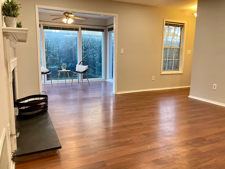 Living room with sunroom access