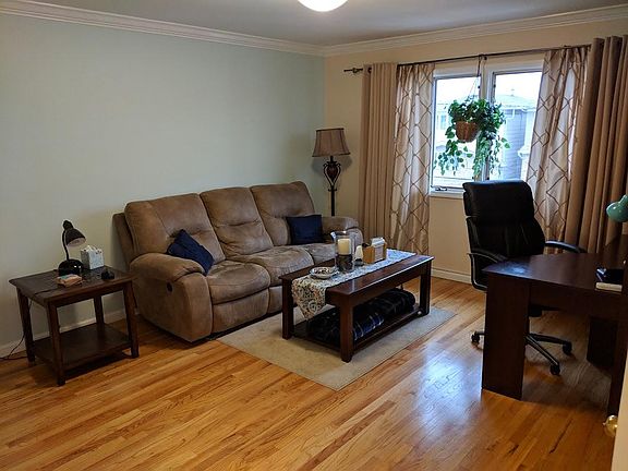Living Room with subtle mint accent wall