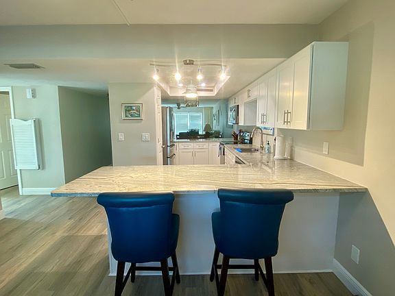 Generous counter height seating with open views