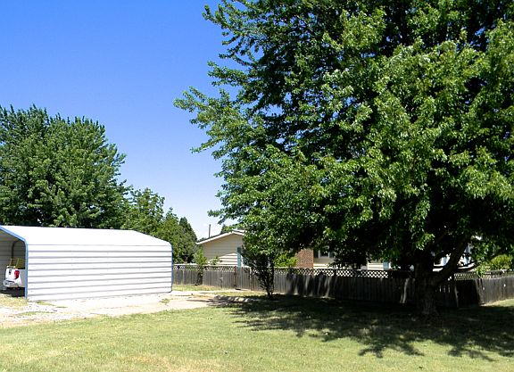 carport in front, parking +