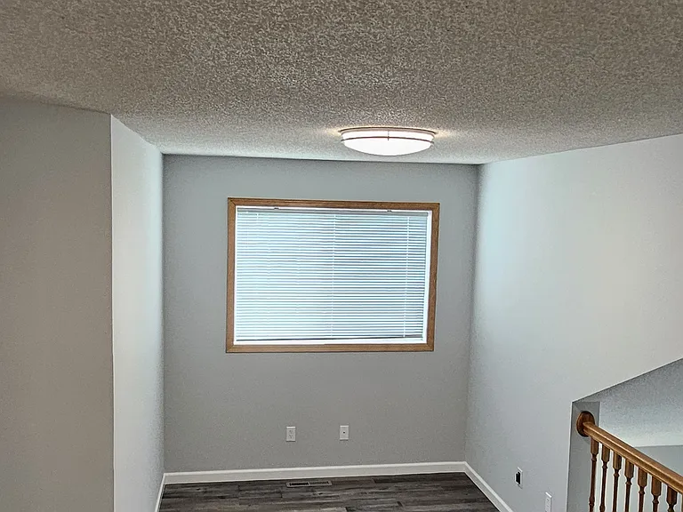 Den / with overlook to living area.