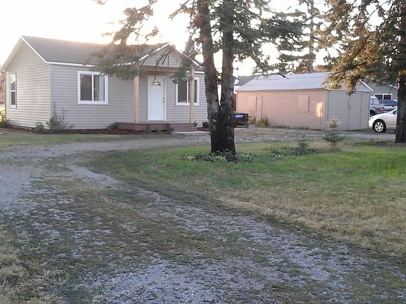 Front view, driveway, garage