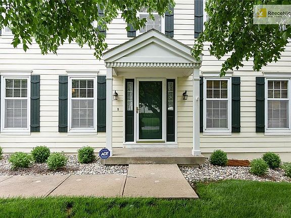 Stately entryway and covered front porch