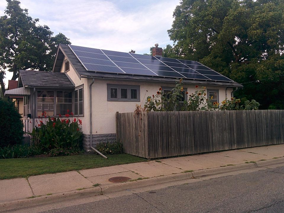 Front porch, privacy fence, lovely landscaping, and solar!