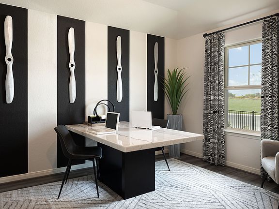Utilize this spacious flex space as a home office or however best suits your needs.