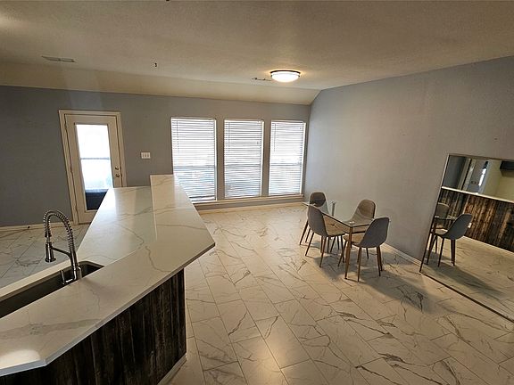 5th image of 611 Gladness