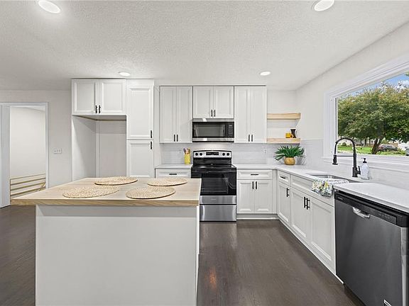 3rd image of 9905 E 71st Ter