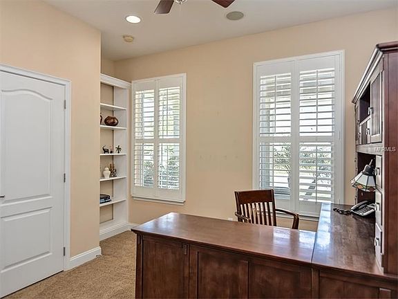 Bedroom 5 is on the 1st floor- used as an office with a closet and built in bookcase.