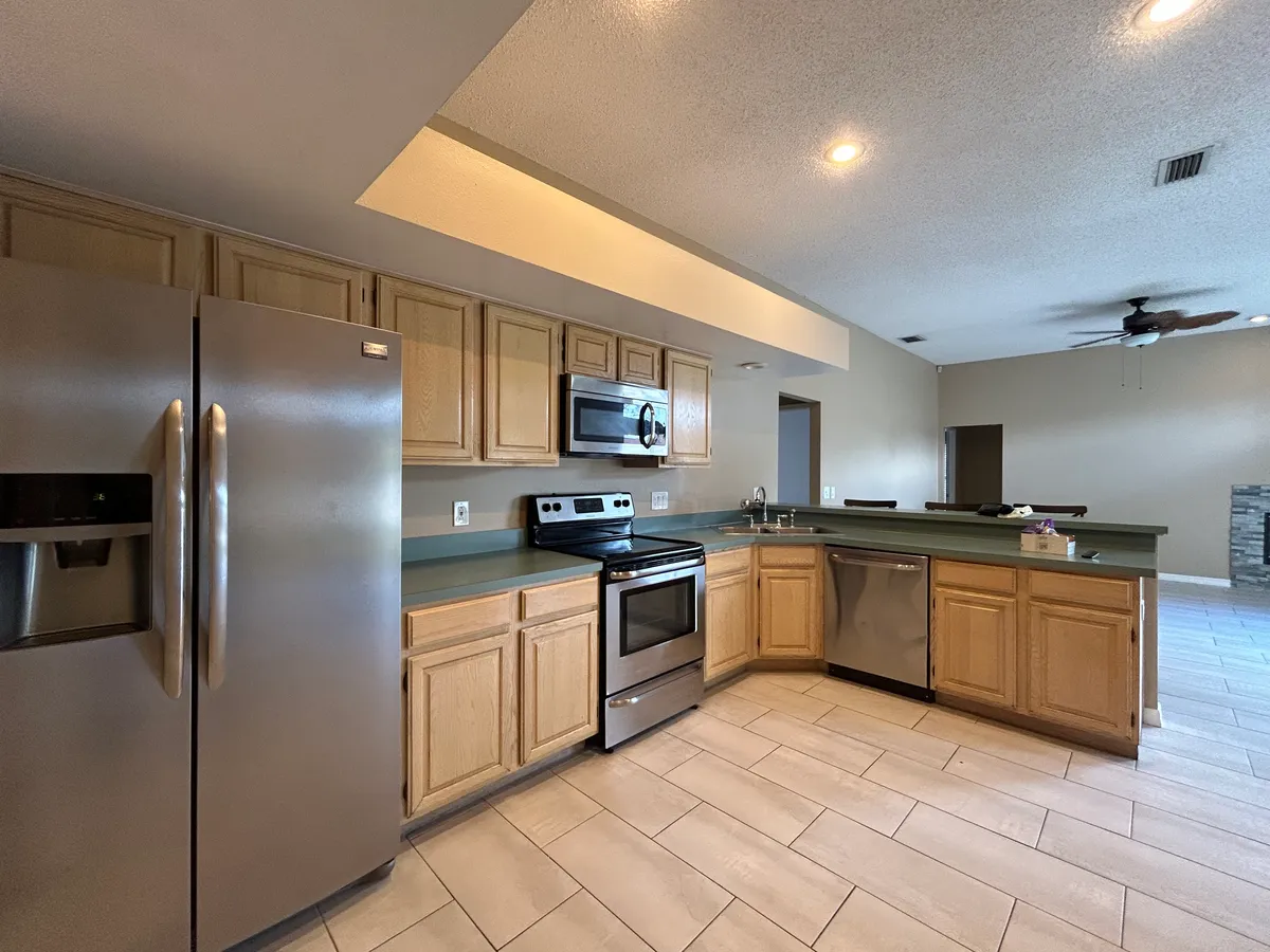 Kitchen - open floor plan and family room area - 2872 Spring Oak Ct