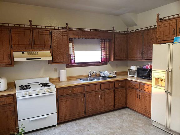 Stove and refrigerator in both units are included