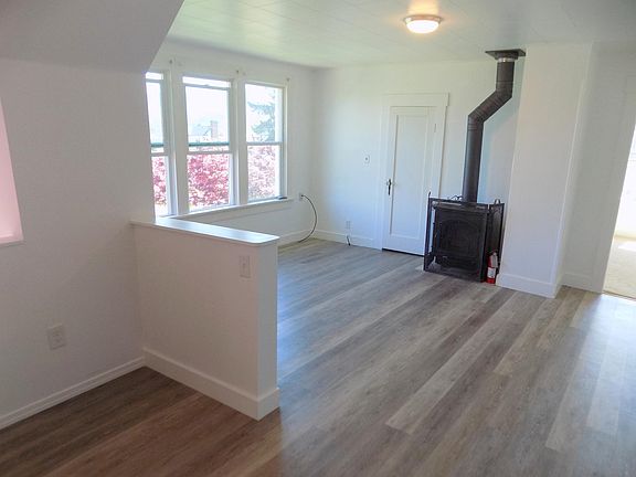 Bird's eye view living room with remote gas fireplace 