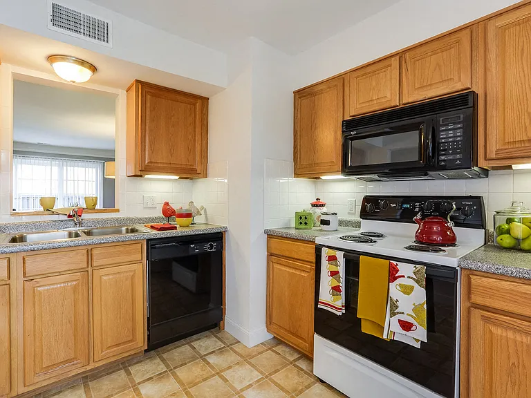 Our kitchens feature garbage disposals, dishwashers and built-in microwaves