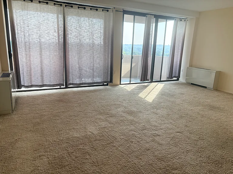 Interior photos taken before new carpeting and fresh paint.