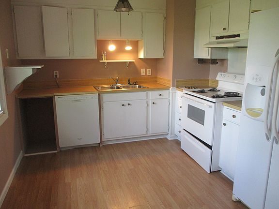 Kitchen, one half. Pantry & more cabinet storage in 2nd half