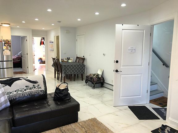 View from living room area. Entrance door to right.