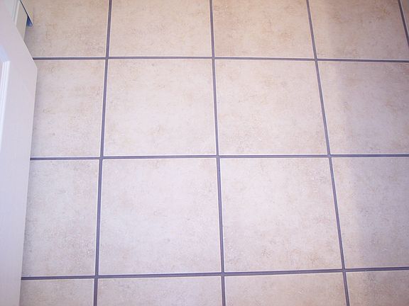 Ceramic tile in kitchen & bathrooms