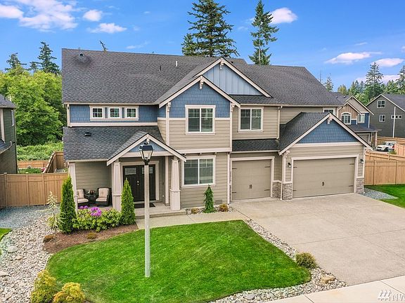 5 car garage & stunning upgrades throughout.