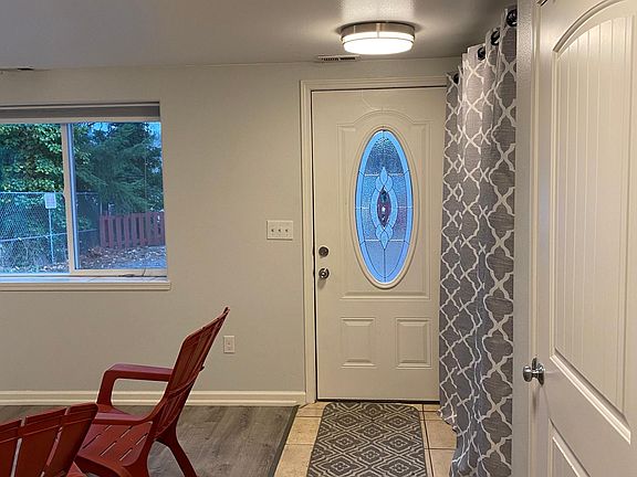 Front Hallway with Laundry behind curtain