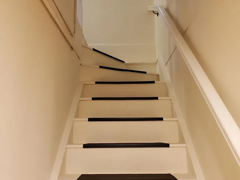 Stairs in unit to unit entry.