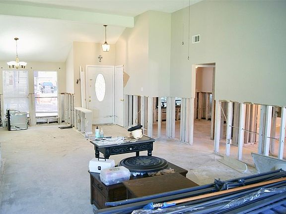 Living Room looking towards front entry and Dining Room