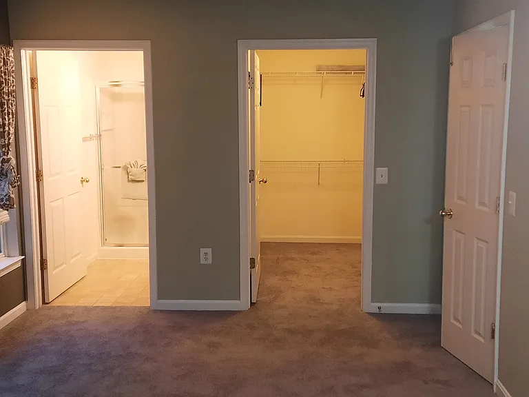 Master Bedroom, looking into master closet and master bathroom.