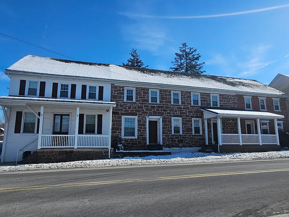 Front street view of the building and entrance.