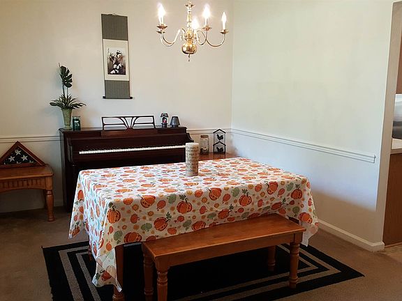 The dining room features a chair rail, for an added architectural flair!