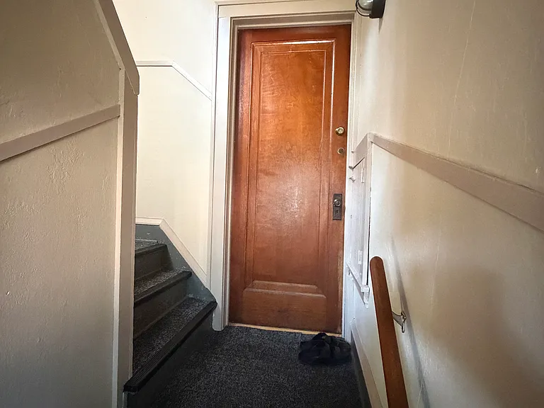 Unit backdoor from shared rear stairwell